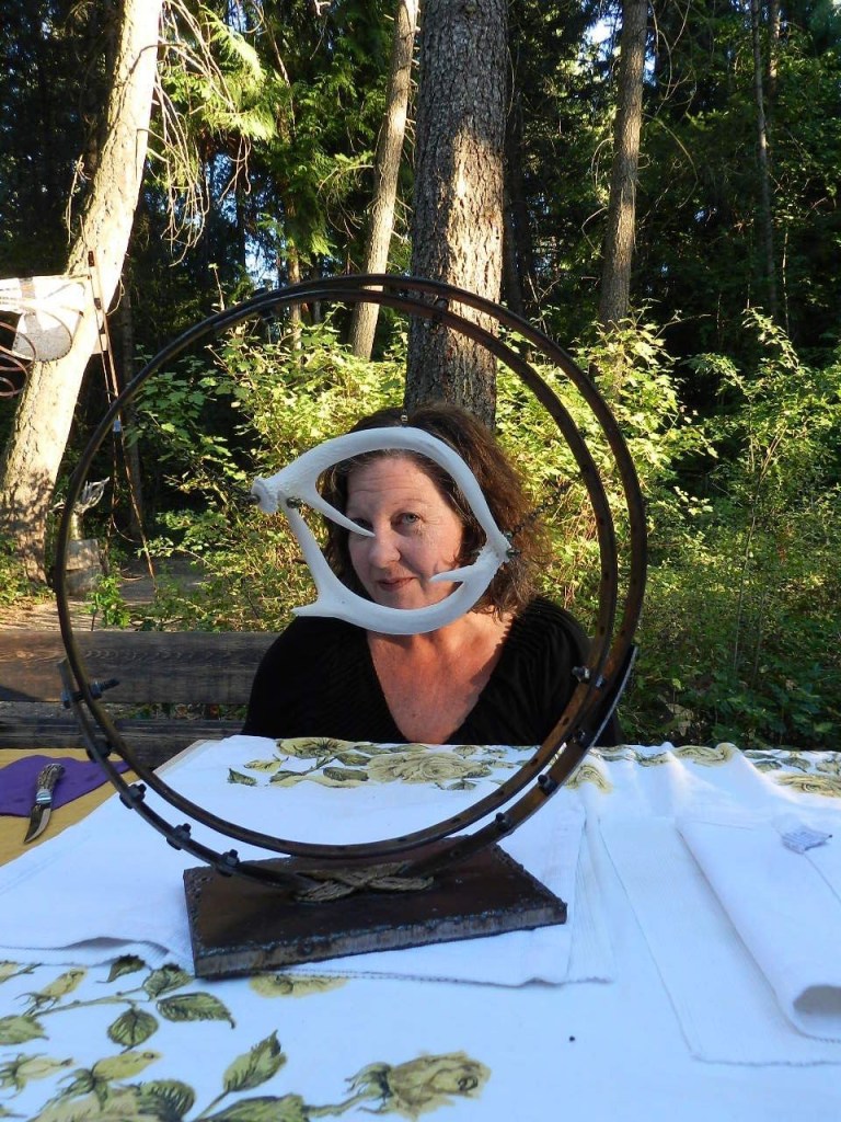 Lori Mairs in Woodhaven with bone and iron sculpture